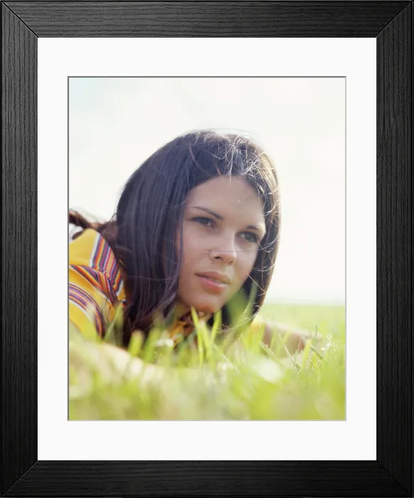 Framed Print : 1970s PORTRAIT TEEN GIRL BRUNETTE LYING IN GRASS Framed Print : 1970s PORTRAIT TEEN GIRL BRUNETTE LYING IN GRASS