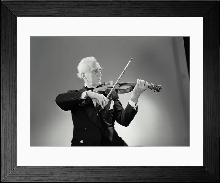 Framed Print : Close-up of a violinist playing a violin Framed Print : Close-up of a violinist playing a violin