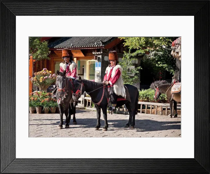 Framed Print : China, Yunnan Province, Lijiang, Naxi men on horseback wearing traditional costume including Red panda skin hats Framed Print : China, Yunnan Province, Lijiang, Naxi men on horseback wearing traditional costume including Red panda skin hats