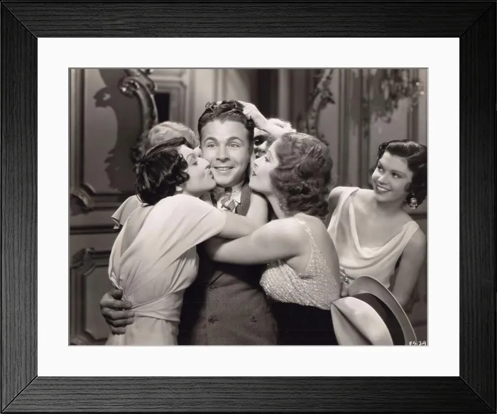 Framed Print : Women kissing Dick Powell, from 'Gold Diggers of 1933', Exclusive in your city