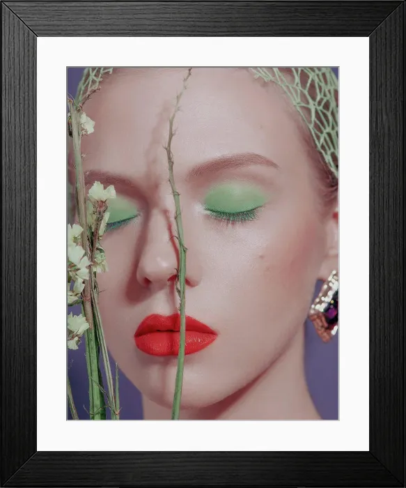 Framed Print : Young girl on purple. Bright makeup: red lips, green eyeshadows Framed Print : Young girl on purple. Bright makeup: red lips, green eyeshadows