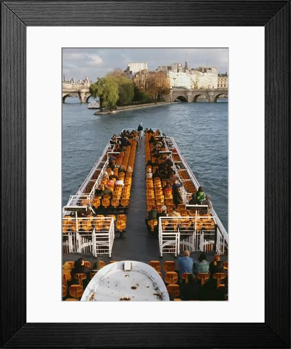 Framed Print : Tourists in a tourboat, Seine River, Paris, Ile-de-France, France Framed Print : Tourists in a tourboat, Seine River, Paris, Ile-de-France, France