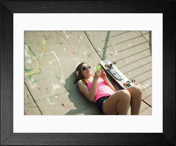 Framed Print : Teenage Girl Listening to MP3 Player in Skatepark, Feudenheim, Mannheim, Baden-Wurttemberg, Germany, 07 / 10 / 2013 Framed Print : Teenage Girl Listening to MP3 Player in Skatepark, Feudenheim, Mannheim, Baden-Wurttemberg, Germany, 07 / 10 / 2013