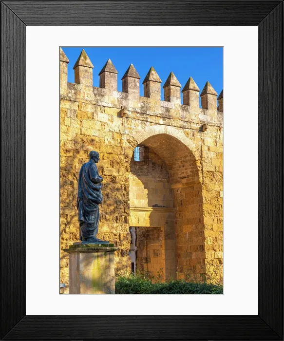 Framed Print : Statue of Seneca with the Almodovar Gate and Walls of Cordoba built in the Caliphate Period