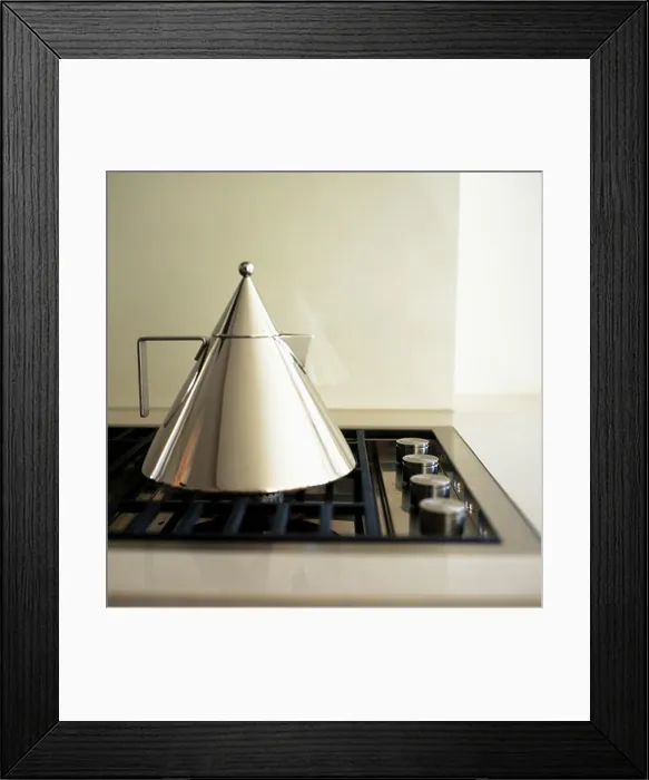 Framed Print : Close up of Alessi Conico stainless steel tea kettle on hob Framed Print : Close up of Alessi Conico stainless steel tea kettle on hob