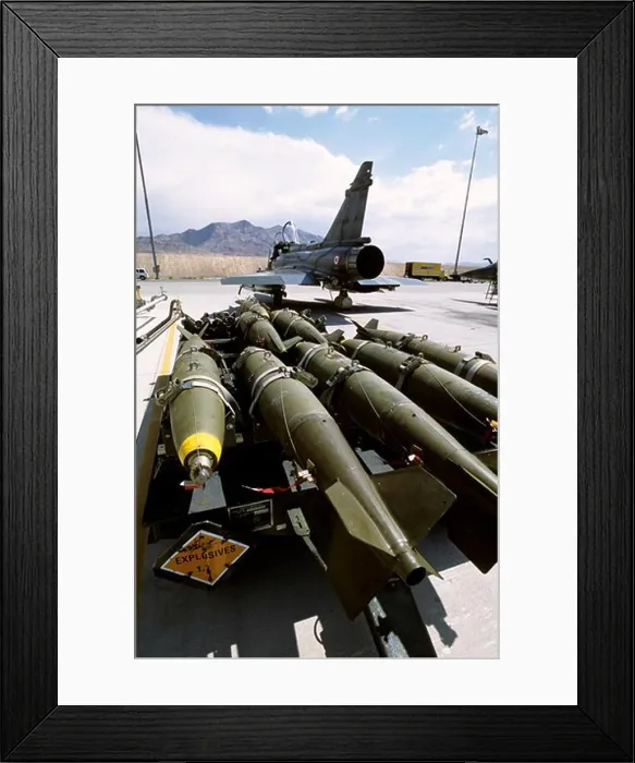 Framed Print : French Air Force Dassualt MFG Mirage 2000 fighter-bomber loading 500 pound bombs / ordnance