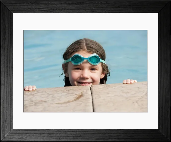Framed Print : Girl with swimming goggles by pool Framed Print : Girl with swimming goggles by pool