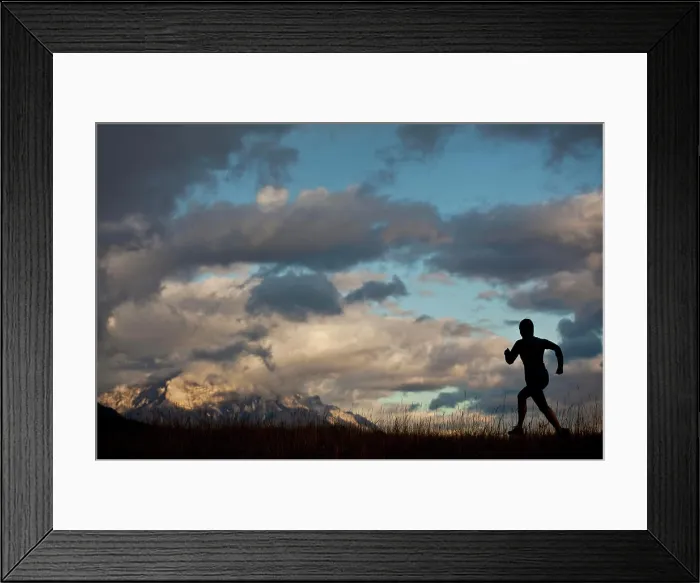 Framed Print : A young woman out an early morning trail run. Canmore, AB Framed Print : A young woman out an early morning trail run. Canmore, AB