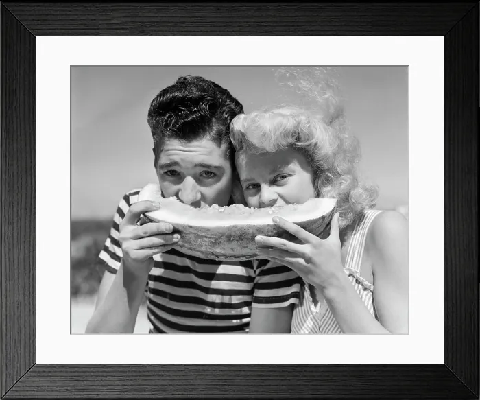 Framed Print : 1940S 1950S Teen Age Boy & Girl Eating Slice Watermelon