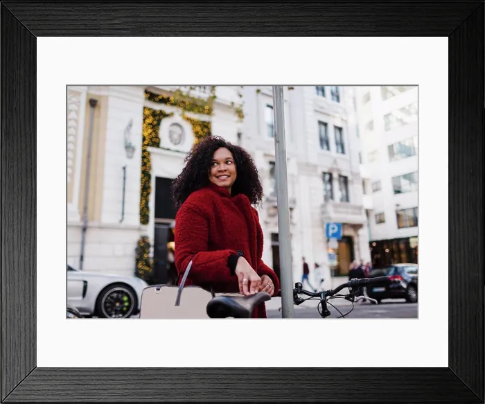 Framed Print : Happy young woman on urban street Framed Print : Happy young woman on urban street