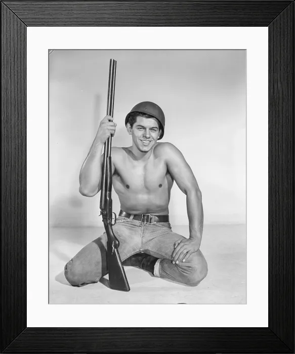Framed Print : Shirtless Young Soldier with Rifle c.1959 Framed Print : Shirtless Young Soldier with Rifle c.1959