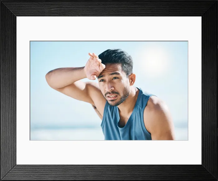 Framed Print : Fitness, sweating and man breathing at the beach after training Framed Print : Fitness, sweating and man breathing at the beach after training