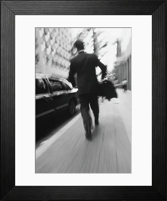 Framed Print : Back View of Businessman Walking On Street Carrying Briefcase Framed Print : Back View of Businessman Walking On Street Carrying Briefcase