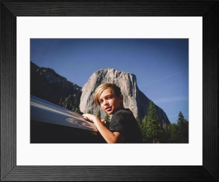 Framed Print : Blonde Boy Hangs from Car window with El Cap in the Background Framed Print : Blonde Boy Hangs from Car window with El Cap in the Background