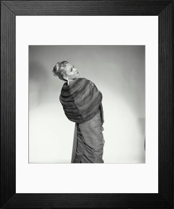 Framed Print : Rear view of a young woman standing Framed Print : Rear view of a young woman standing