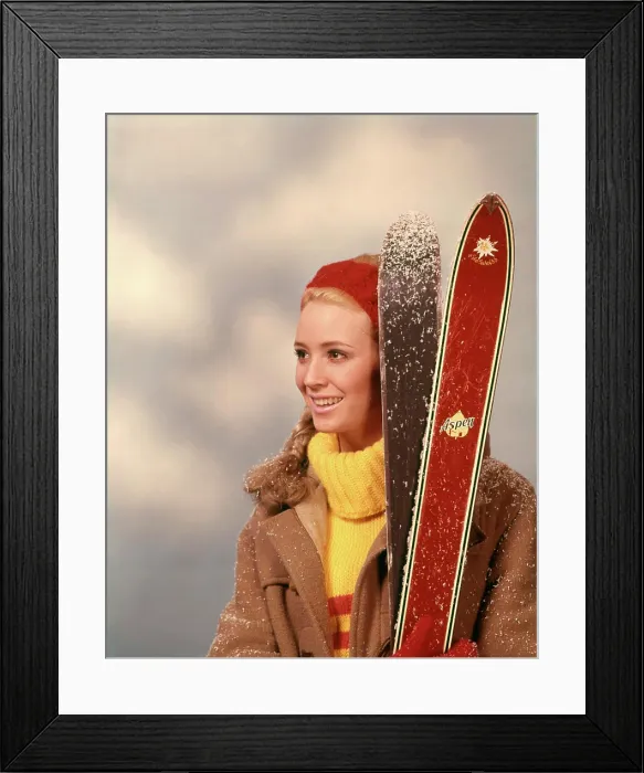 Framed Print : 1960s 1970s PORTRAIT WOMAN RED HEADBAND YELLOW TURTLENECK SWEATER HOLDING PAIR OF SKIS SKIER Framed Print : 1960s 1970s PORTRAIT WOMAN RED HEADBAND YELLOW TURTLENECK SWEATER HOLDING PAIR OF SKIS SKIER