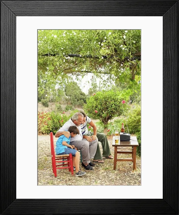Framed Print : Grandfather, Father and Son Watching Television in Backyard Framed Print : Grandfather, Father and Son Watching Television in Backyard