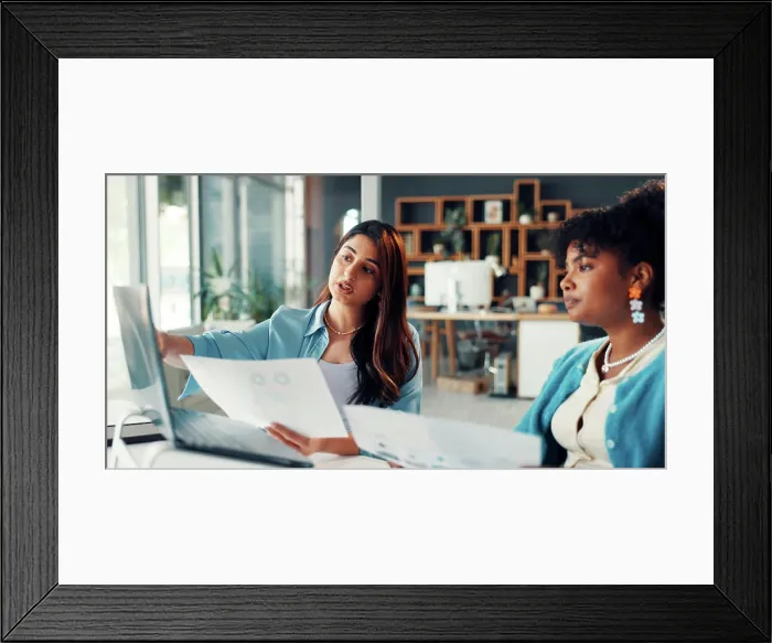 Framed Print : Media agency, laptop and women with documents Framed Print : Media agency, laptop and women with documents