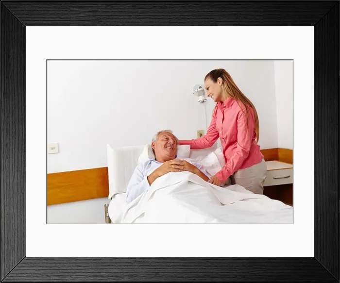 Framed Print : Hospital visit from the family daughter for sick senior
