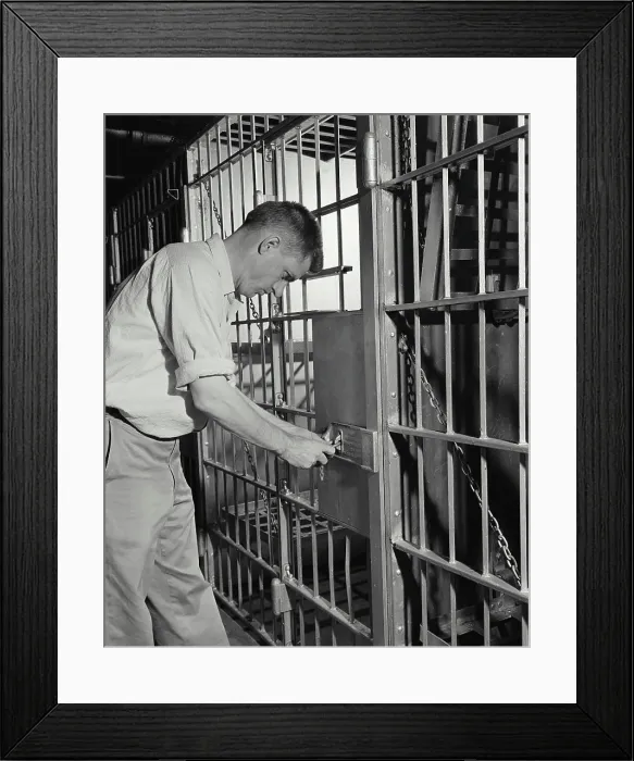 Framed Print : Vintage Photograph. Jailer locking cell Framed Print : Vintage Photograph. Jailer locking cell