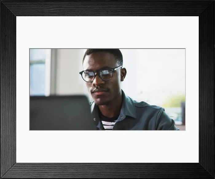 Framed Print : Laptop, glasses and reading with business black man in office for news article