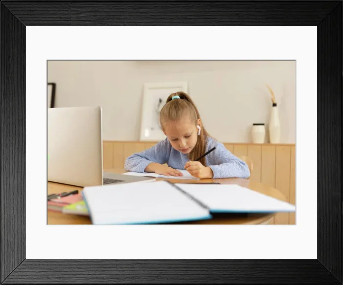 Framed Print : girl studying from home online Framed Print : girl studying from home online