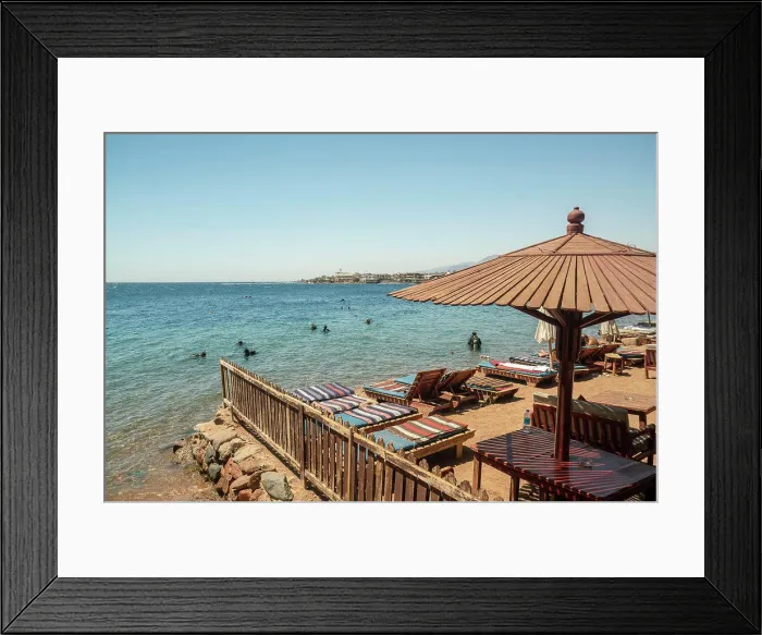 Framed Print : Egypt, Sinai, Beach with sunbeds and people bathing in sea Framed Print : Egypt, Sinai, Beach with sunbeds and people bathing in sea