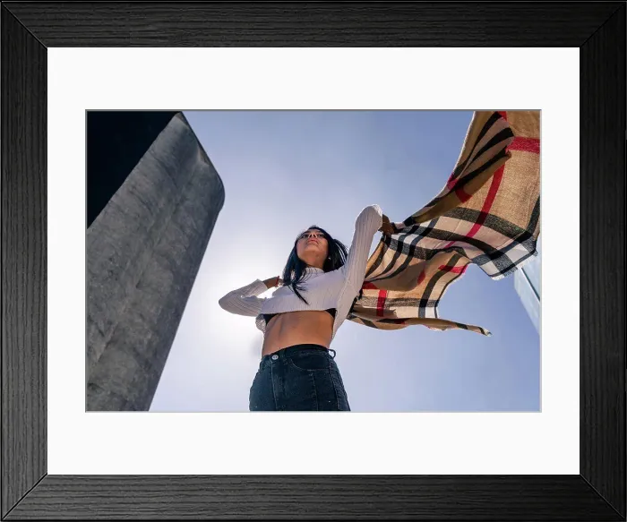 Framed Print : Young Latin woman moving and playing with a ruana Framed Print : Young Latin woman moving and playing with a ruana