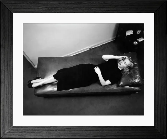 Framed Print : 1950S Worried Woman Hand To Forehead Seen From Above Lying Down On Psychiatrist Therapy Couch Framed Print : 1950S Worried Woman Hand To Forehead Seen From Above Lying Down On Psychiatrist Therapy Couch