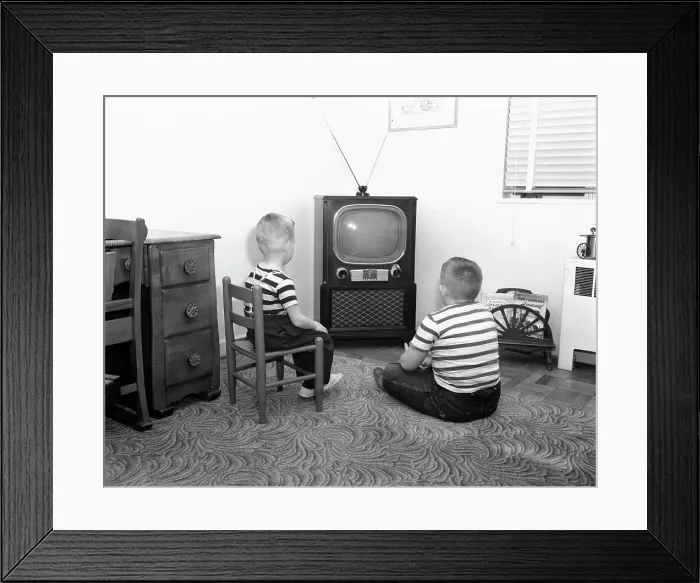 Framed Print : 1950S Back View Of 2 Boys In Striped T-Shirts Watching Tv Framed Print : 1950S Back View Of 2 Boys In Striped T-Shirts Watching Tv