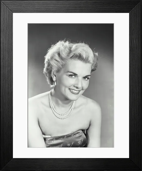 Framed Print : Vintage photograph. Woman in strapless dress smiling at camera Framed Print : Vintage photograph. Woman in strapless dress smiling at camera