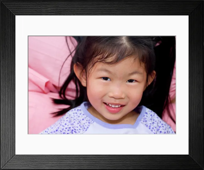 Framed Print : Little Asian girl lying on bed Little Asian girl lying on bed Framed Print : Little Asian girl lying on bed Little Asian girl lying on bed
