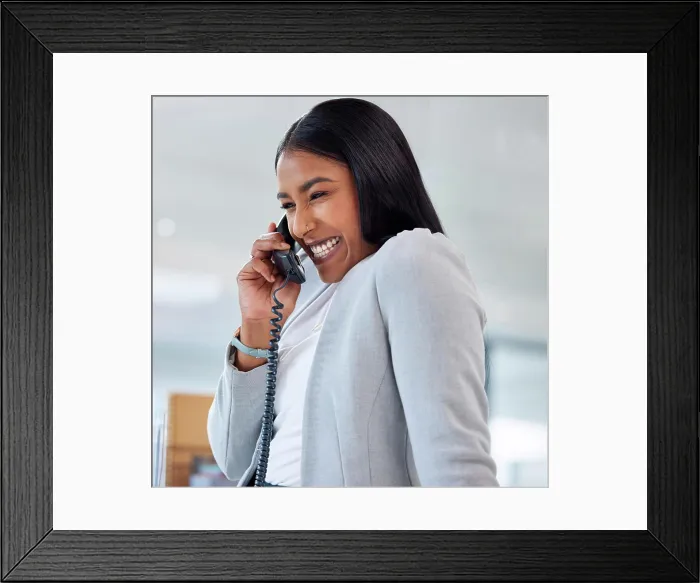 Framed Print : Happy, telephone and woman on a phone call in the office laughing for a comic funny joke