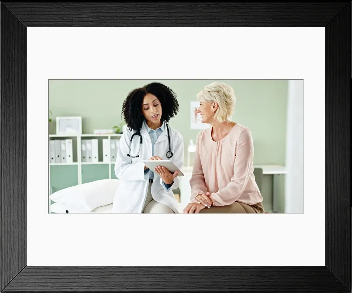 Framed Print : Woman, doctor and consulting patient with tablet in checkup for medical results Framed Print : Woman, doctor and consulting patient with tablet in checkup for medical results