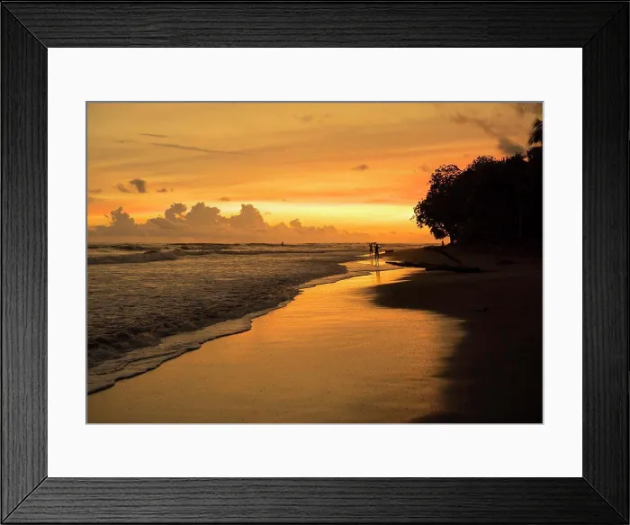 Framed Print : People walking on tropical beach at sunset Framed Print : People walking on tropical beach at sunset