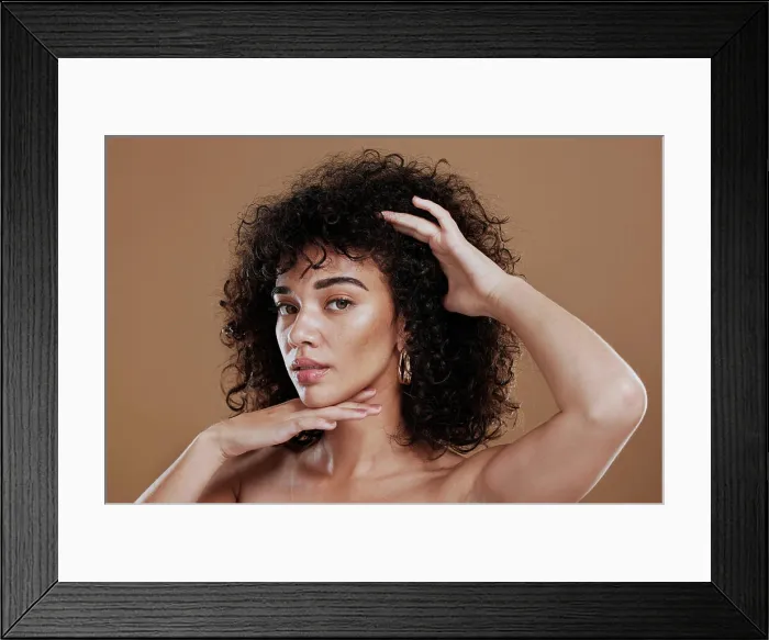Framed Print : Face, skincare and hair with a model black woman in studio on a brown background for natural keratin treatment Framed Print : Face, skincare and hair with a model black woman in studio on a brown background for natural keratin treatment