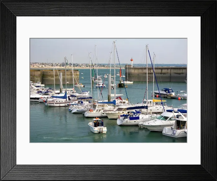 Framed Print : Boats docked at The Harbor of Granville, a coastal commune in the department of Manche, France Framed Print : Boats docked at The Harbor of Granville, a coastal commune in the department of Manche, France
