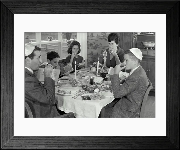 Framed Print : Jewish family taking Seder dinner during Passover festival