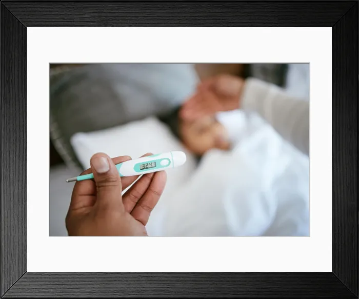Framed Print : Sick, kid and parent in bed with thermometer for cold