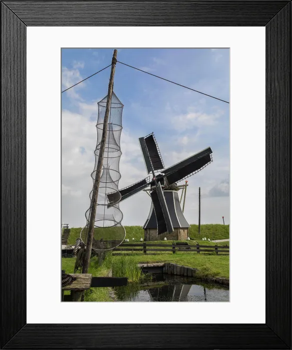 Framed Print : Windmill in a reconstruction of a 19th century Dutch fishing village at the Zuiderzee Open Air Museum in the Netherlands Framed Print : Windmill in a reconstruction of a 19th century Dutch fishing village at the Zuiderzee Open Air Museum in the Netherlands
