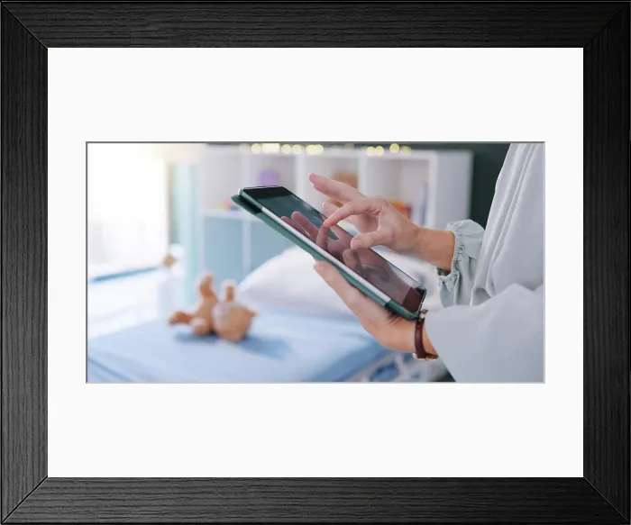 Framed Print : Person, pediatrician and hands with tablet for childcare research Framed Print : Person, pediatrician and hands with tablet for childcare research
