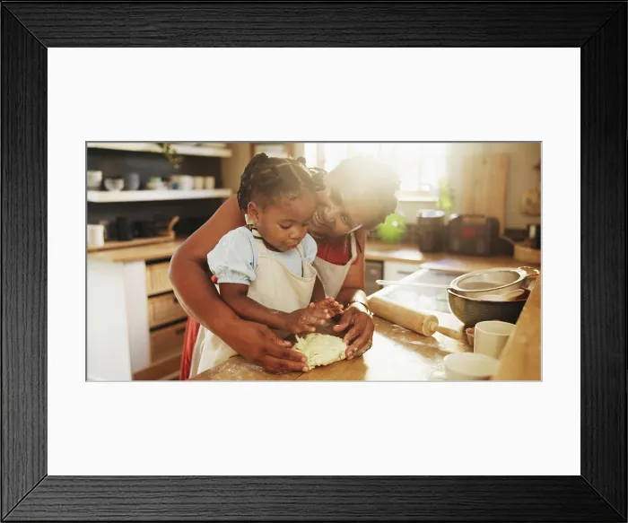 Framed Print : Black woman, child and teaching with dough Framed Print : Black woman, child and teaching with dough