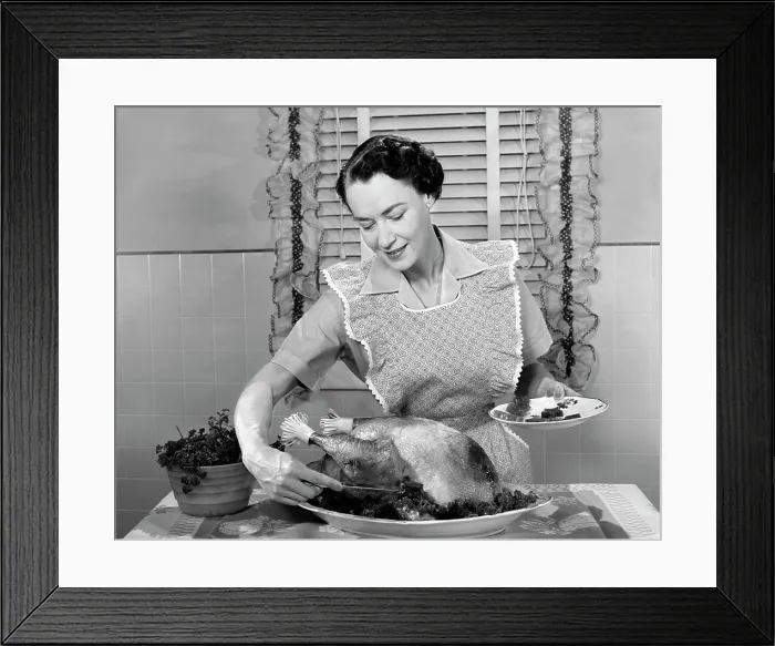 Framed Print : 1960S Woman In Apron Dishing Cranberry Sauce Out Around Turkey