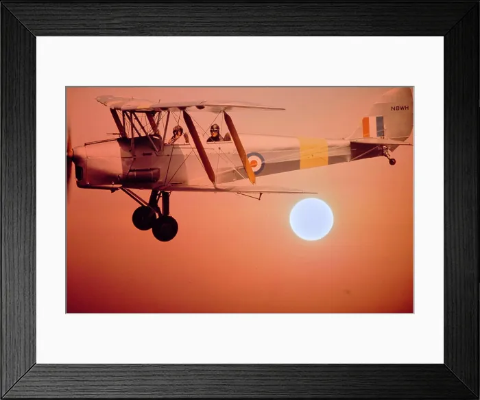 Framed Print : Vintage Photograph. Vintage biplane soars against a stunning sunset sky Framed Print : Vintage Photograph. Vintage biplane soars against a stunning sunset sky