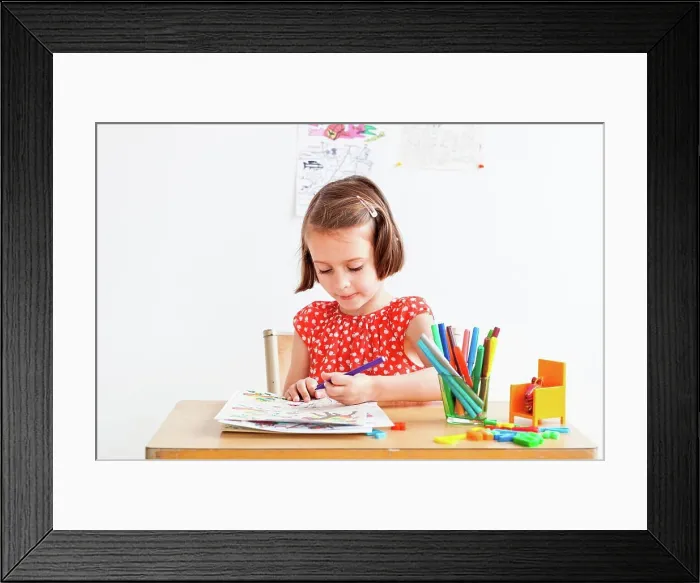 Framed Print : 5 year old girl in a classroom