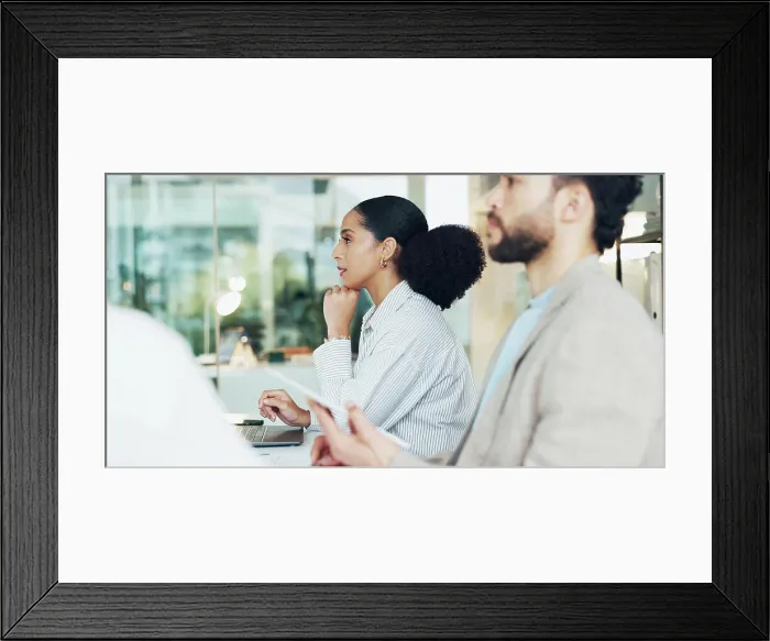 Framed Print : Meeting, thinking and business woman listening with team for financial review Framed Print : Meeting, thinking and business woman listening with team for financial review