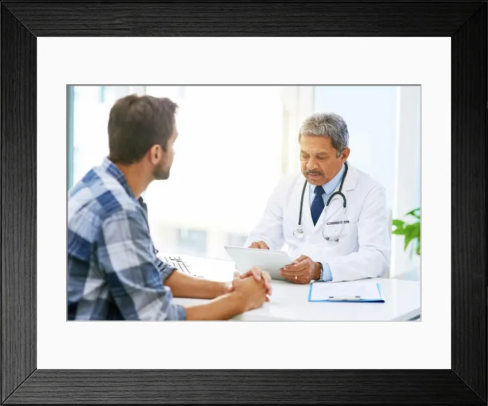 Framed Print : Senior doctor tablet, man patient and results with medical consultation and discussion in clinic