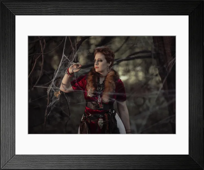 Framed Print : Witch with short hair in dress against the background of wild nature