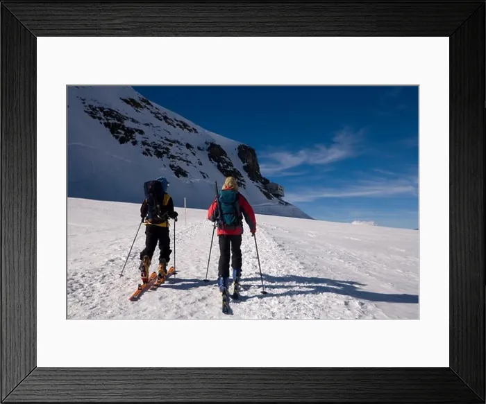 Framed Print : Two people glacier hiking at Jungfraufirn glacier to Moenchsjoch Hut (3650 m highest restaurant in the Swiss Alps) Framed Print : Two people glacier hiking at Jungfraufirn glacier to Moenchsjoch Hut (3650 m highest restaurant in the Swiss Alps)