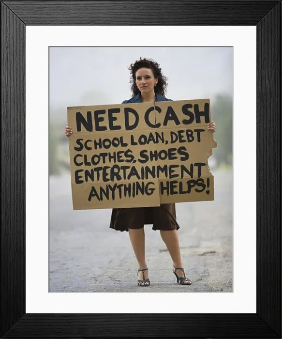 Framed Print : Young woman holding a help-needed sign